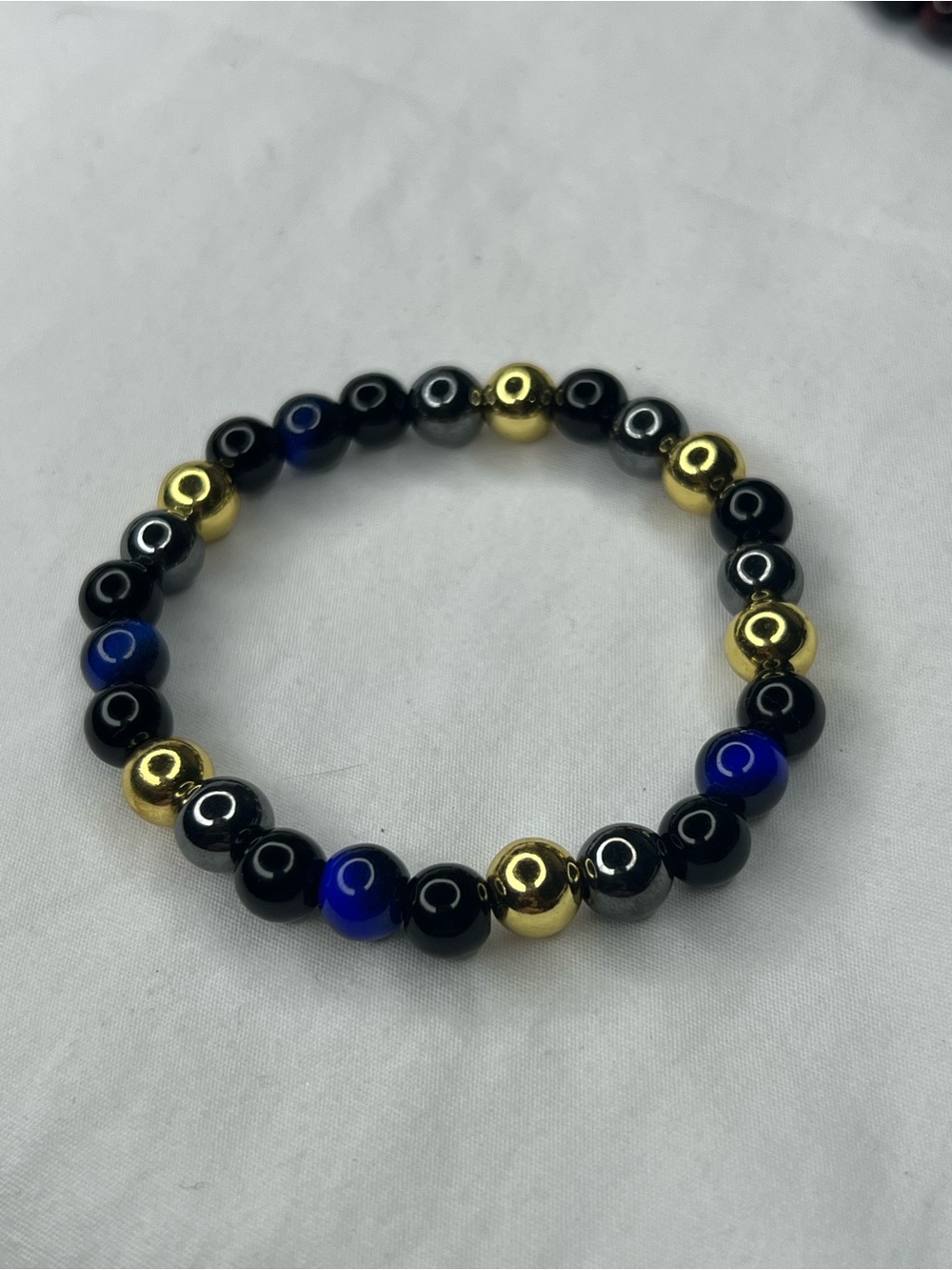 Beaded Stretch Bracelet in Black, Blue Tiger-eyes & Gold